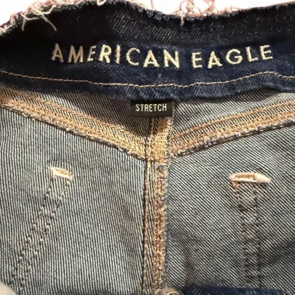 American Eagle denim shorts featuring a distressed look and frayed raw hem - Picture 3 of 8